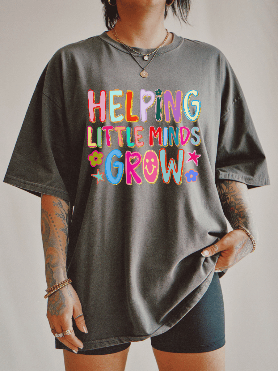 Helping Little Minds Grow Graphic Tee