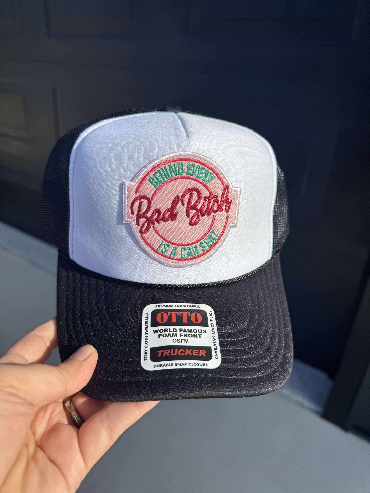 Behind Every Bad B!tch Is A Car Seat Patch Trucker Hat