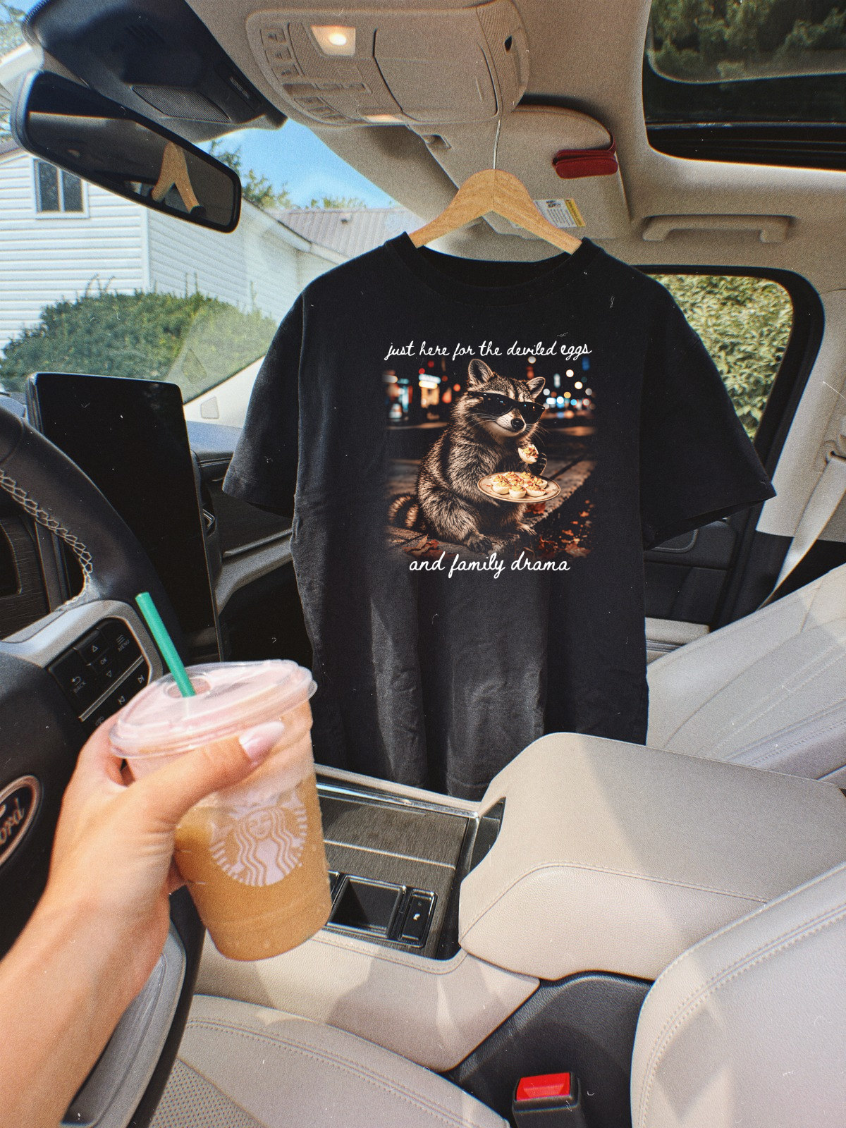 Deviled eggs and family drama raccoon graphic tee