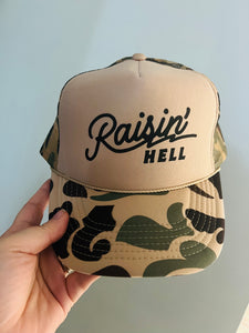 Raisin hell sand camo trucker hat