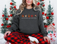 All Booked for Christmas dark charcoal Gildan crewneck