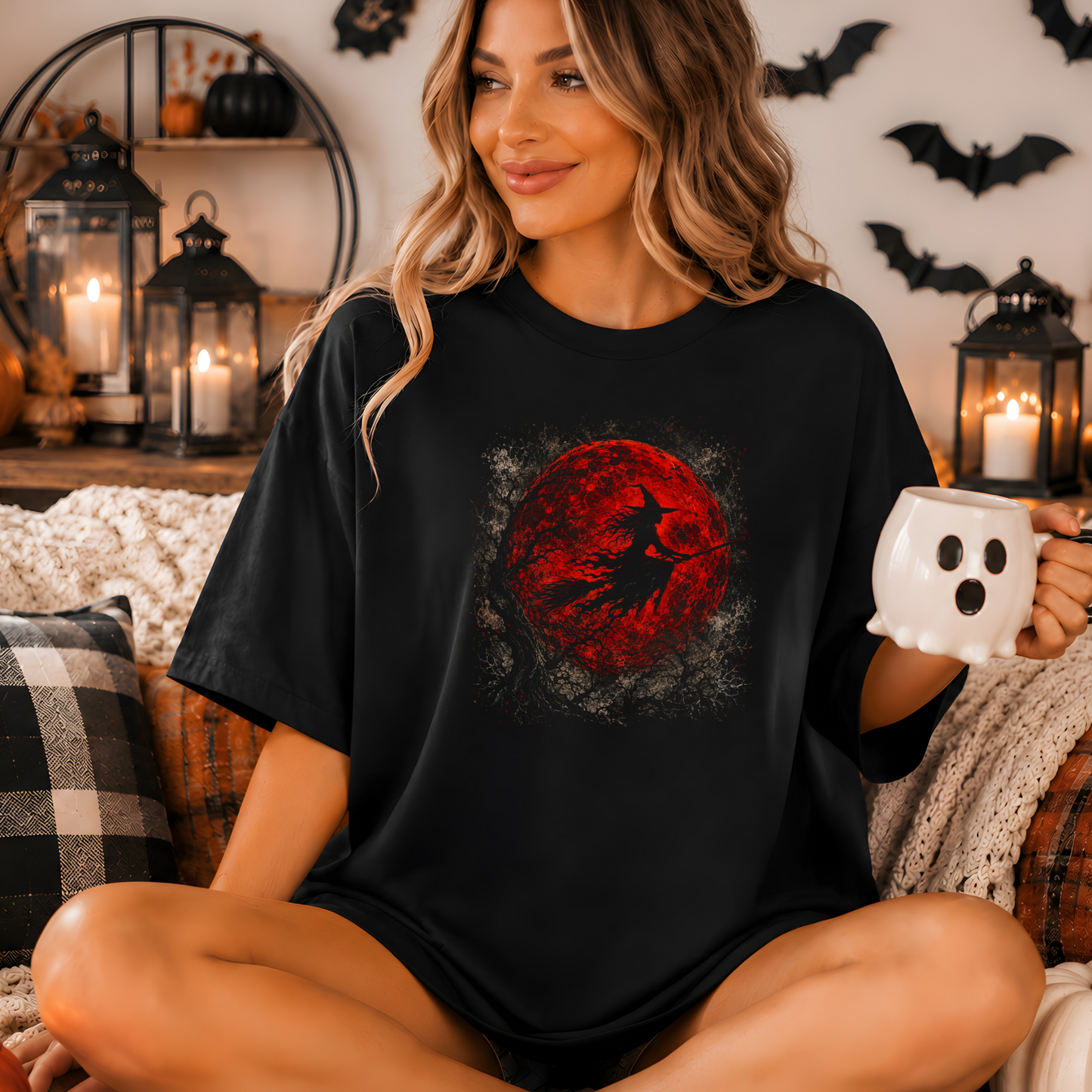 Black Comfort Colors tee with a red moon and flying witch graphic