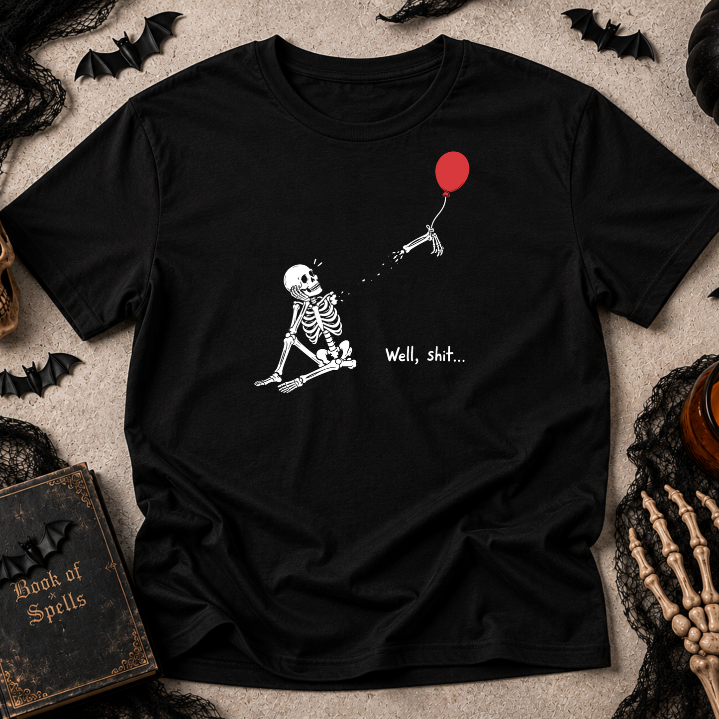 Black Comfort Colors tee with skeleton losing a red balloon graphic