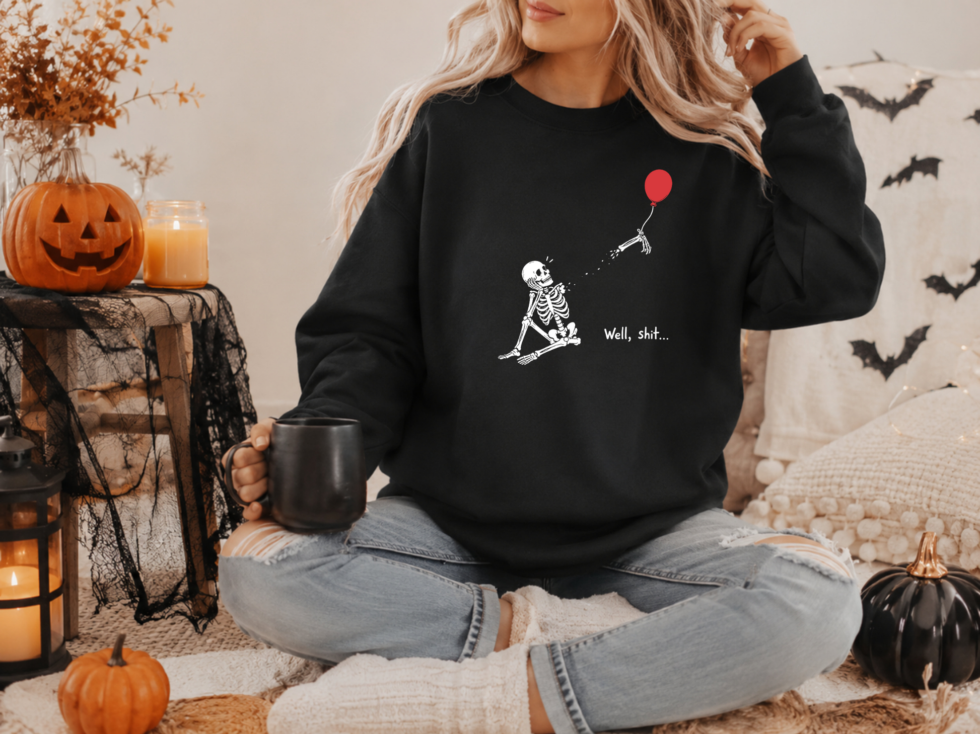 Black Gildan crewneck with skeleton losing a red balloon graphic