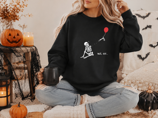 Black Gildan crewneck with skeleton losing a red balloon graphic